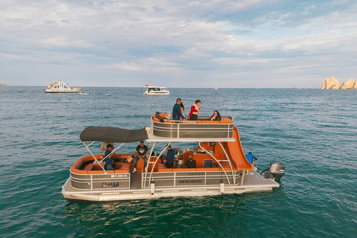 Cruise Cabo San Lucas in style on your private 2-deck yacht, complete with a slide and drinks!