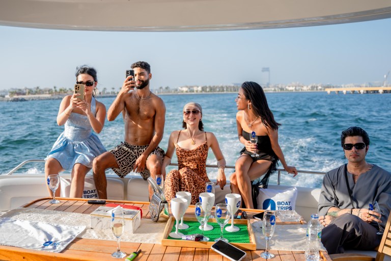 Dubai Ride & Slide Yacht Cruise with BBQ, Snorkeling & Pool