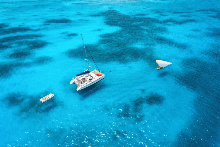 Sail the stunning blue seas on your exclusive Private Kendwa Beach Catamaran Tour!