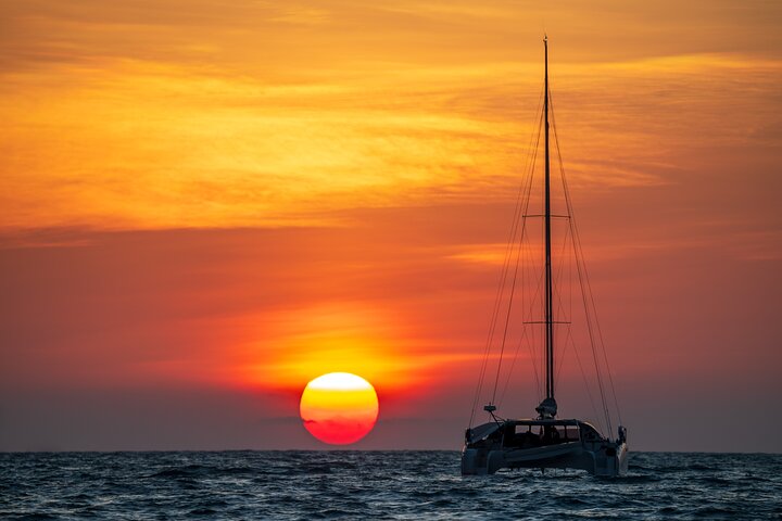 Experience a breathtaking sunset sailing from Kendwa Beach aboard a private catamaran for the perfect romantic evening tour!