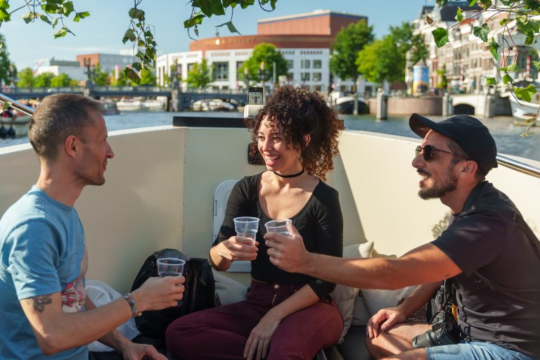 Amsterdam Canal Cruise open boat with bar on board (live guide)