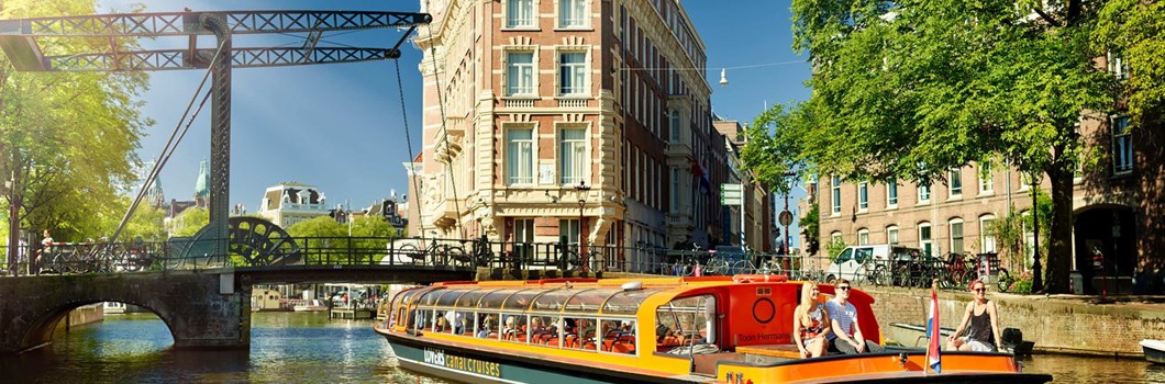 Amsterdam full day tour: Walking, Biking and Cruising
