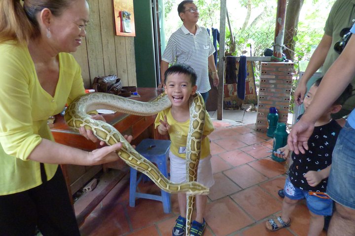 selfie free with python in Mekong delta rest stop
