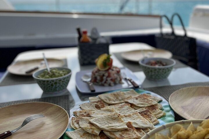 Cozumel shared Luxury Catamaran to El Cielo or Passion Island