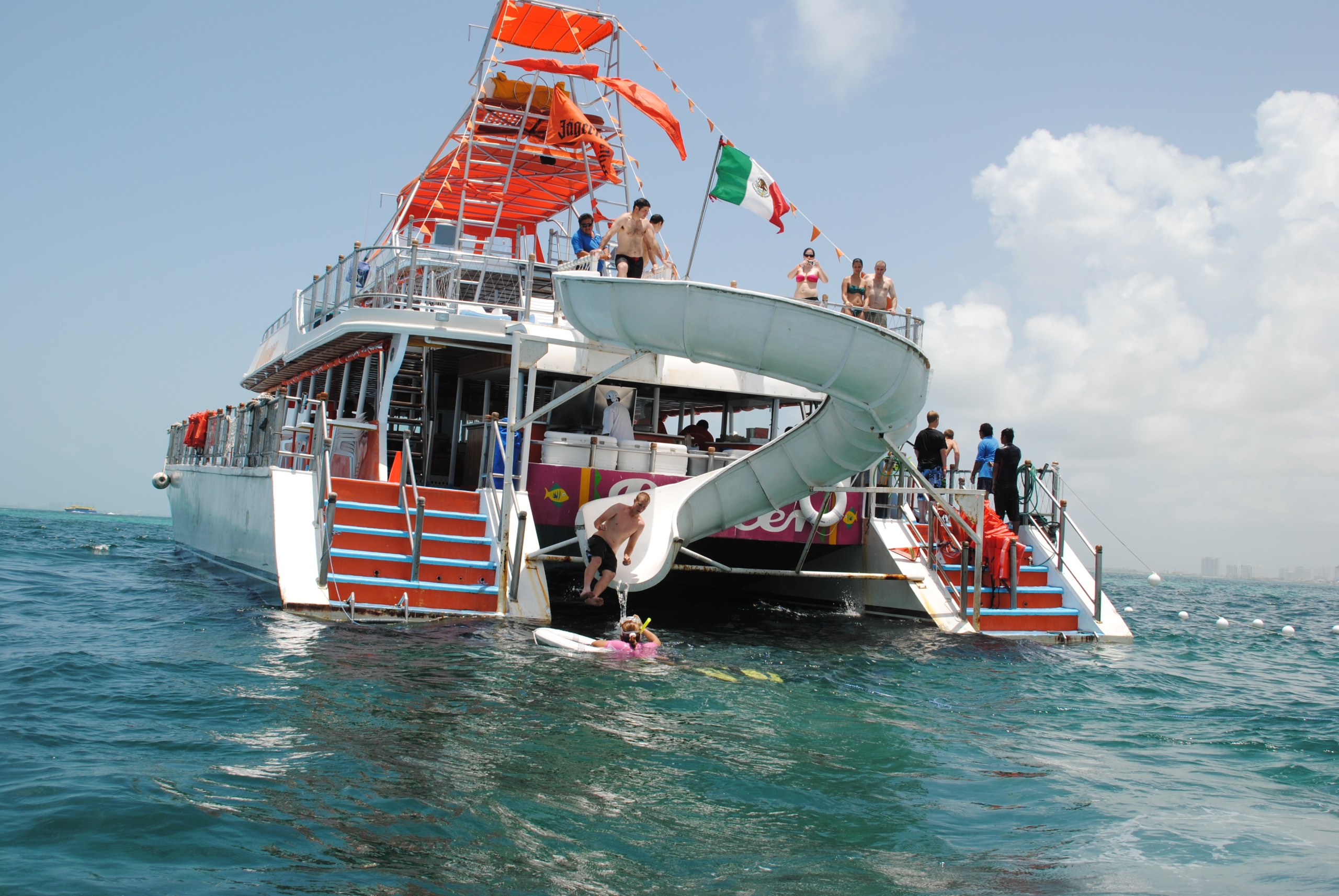 Boat the Isla Mujeres with slide and trampoline