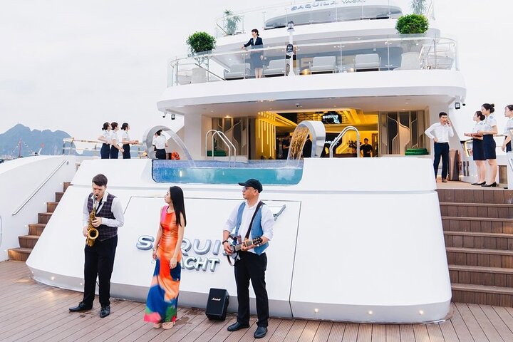 Enjoying the view of Halong City from the Super Yatch