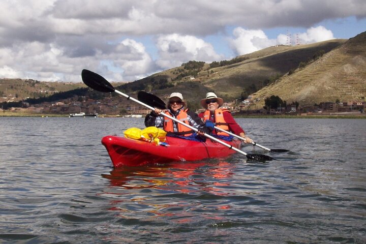 Kayaking by The Uros Island
