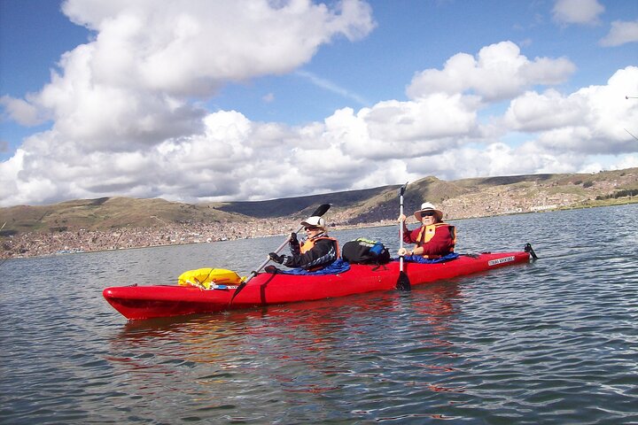 Kayaking by The Uros Island
