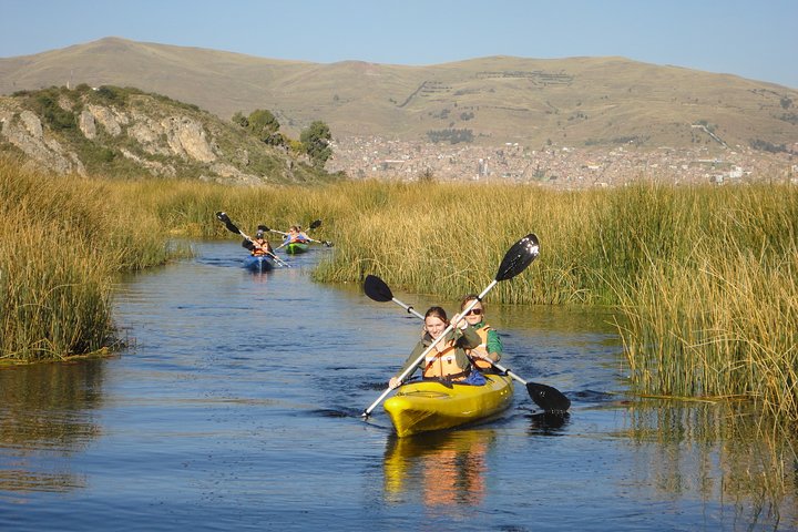 Kayaking by The Uros Island