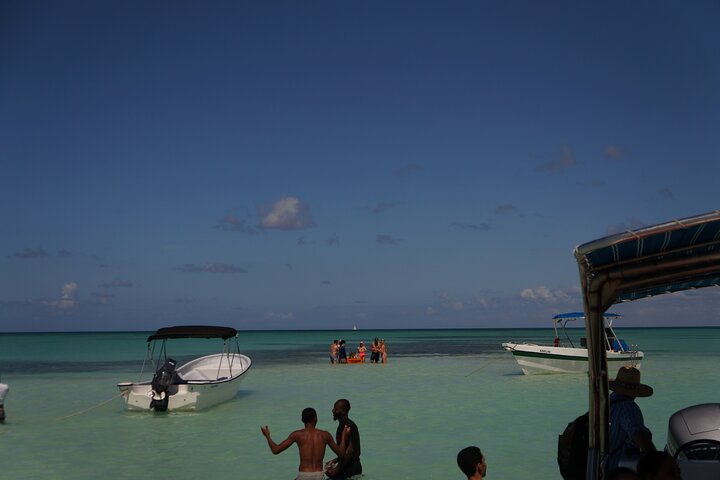 Clients enjoying the natural pool in their private speed boats